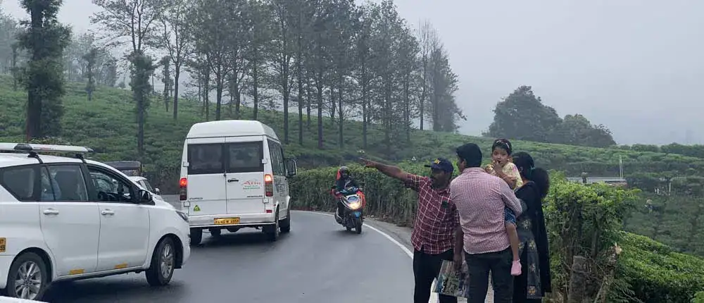 Kerala road trip through scenic hill stations, lush green landscapes and beautiful countryside roads